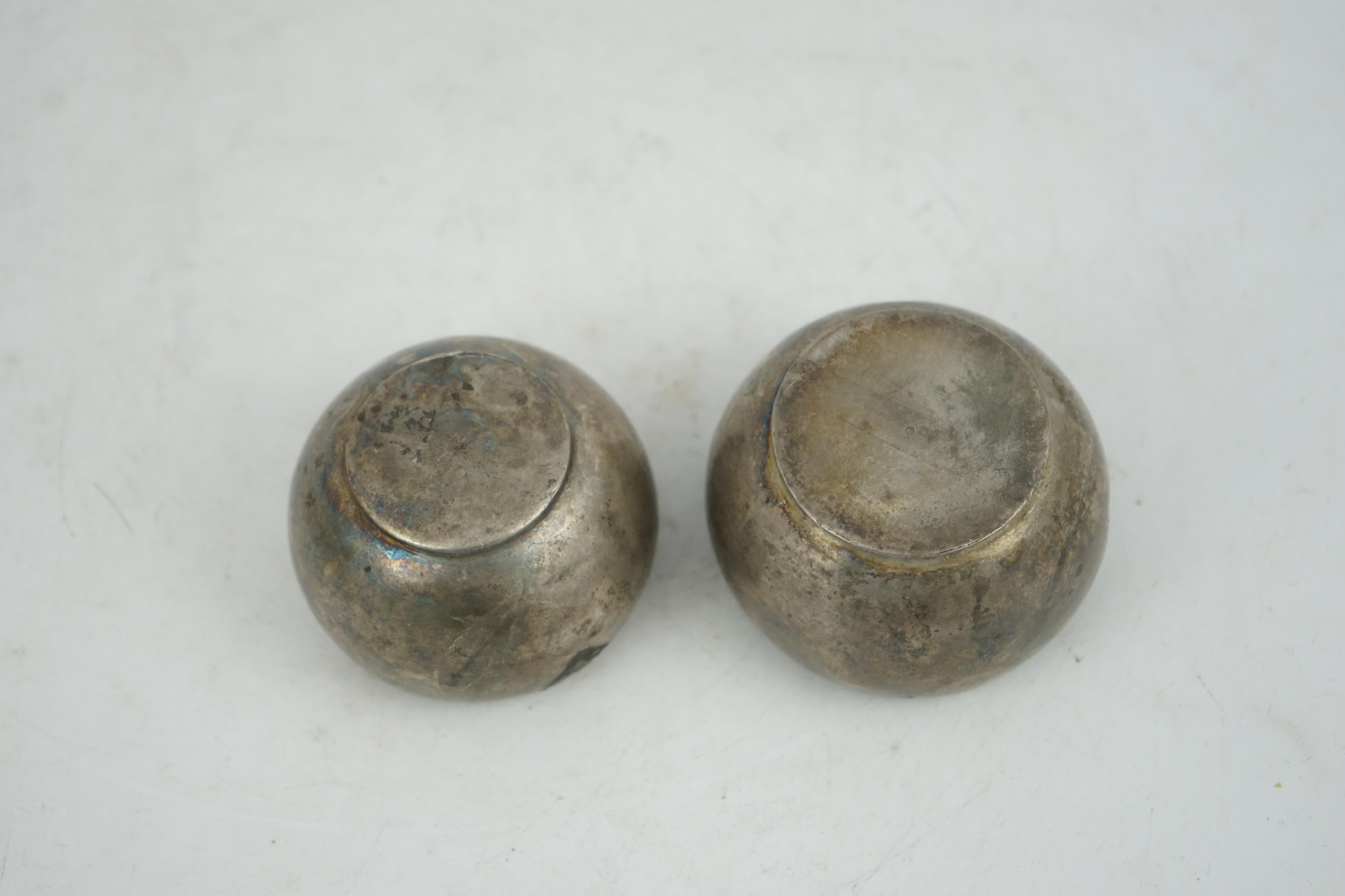 Two silver aryballoi, lacking handles, Roman or Gandhara, c. late 1st century BC - early 1st century A.D.